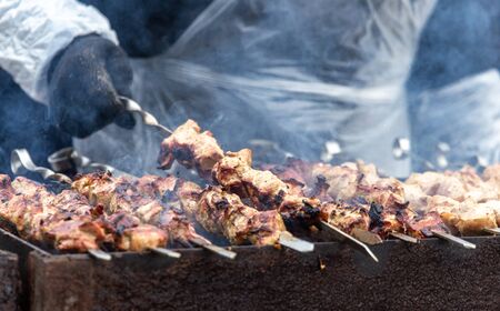 Barbecue skewers grilled on charcoal.の写真素材