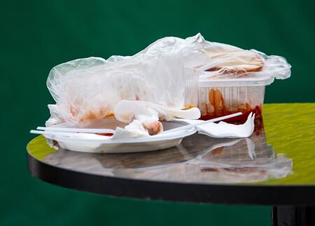 Eaten food in a container on the table.の写真素材