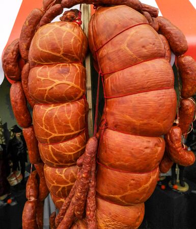 Big smoked sausage in the market.の写真素材