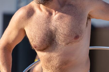Muscles on the chest of a pumped man. Sportsmanの写真素材