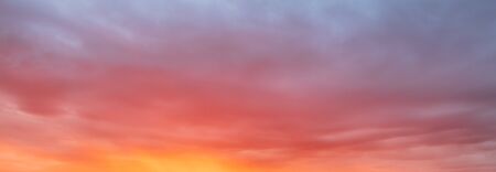 Beautiful clouds at sunset as a background.の写真素材