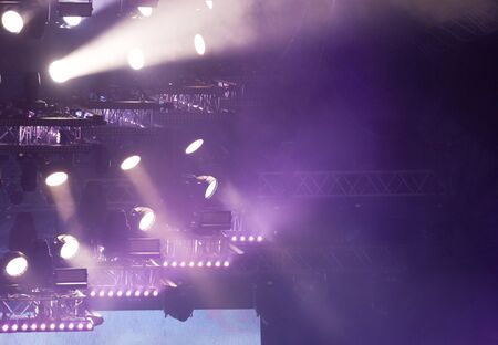 Purple light on a rock concert stage as background.の写真素材