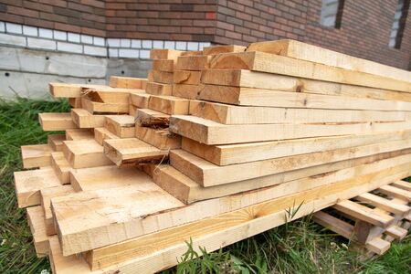 Wooden boards for building a house as a background.の写真素材