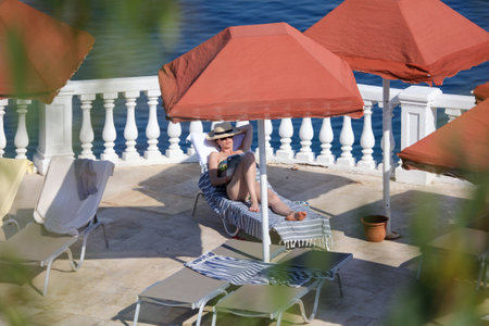 Bodrum, Turkey - August 21, 2019: People relax and swim on the coast of the Aegean Sea in Turkey.のeditorial素材