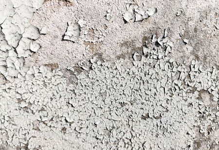 Stucco cracked on the wall as abstract background.の写真素材