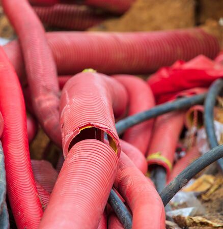 Electric wires on the ground in the park.の写真素材