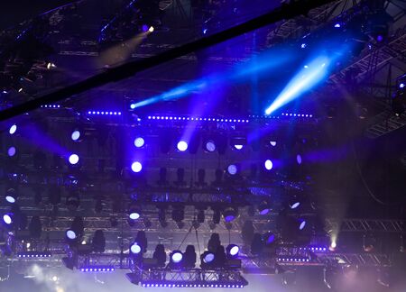 Blue light on a rock concert stage as background.の写真素材