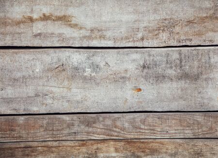 Old wooden boards on the fence as an abstract background.