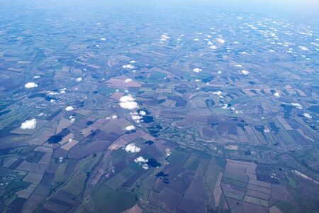 Russian landscape view from the plane. Earth as a background