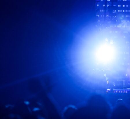 Blue light on a rock concert stage as background.の写真素材