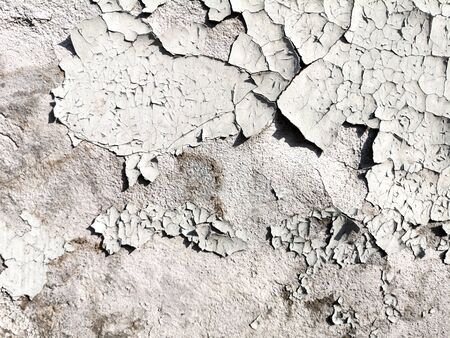Stucco cracked on the wall as abstract background.
