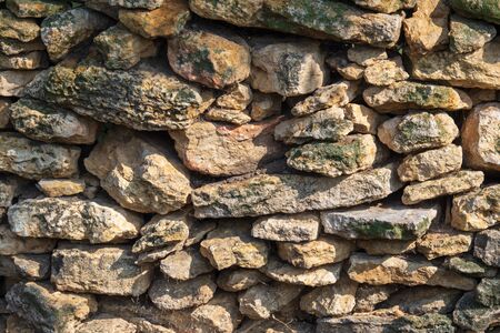 Wall of stone bricks as a background.