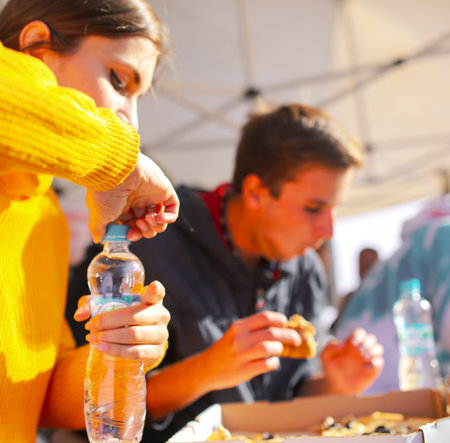 Lipetsk, Russia - September 21, 2019: Gastronomic festival. Pizza eating contest in the park.のeditorial素材
