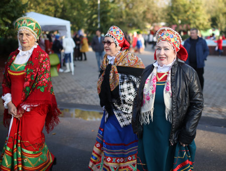 Lipetsk, Russia - September 21, 2019: Gastronomic festival. Women in Russian outfits.のeditorial素材