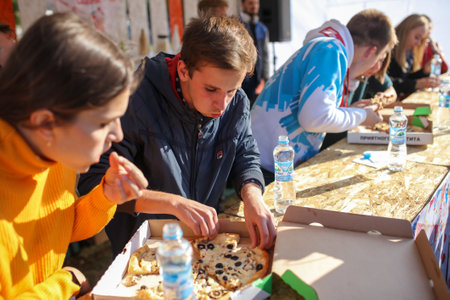 Lipetsk, Russia - September 21, 2019: Gastronomic festival. Pizza eating contest in the park.のeditorial素材