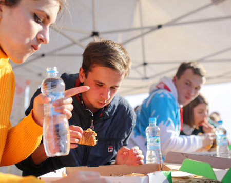 Lipetsk, Russia - September 21, 2019: Gastronomic festival. Pizza eating contest in the park.のeditorial素材