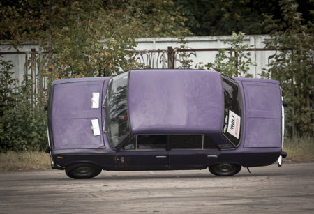 Lipetsk, Russia - October 26, 2019: Auto rides on two wheels at the stunt festival.のeditorial素材