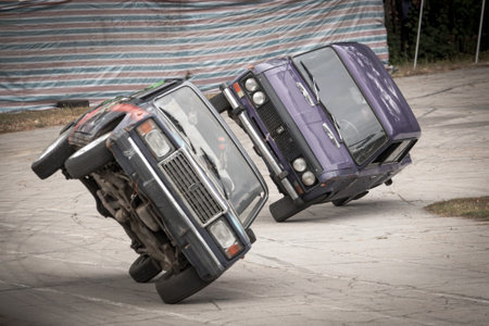 Lipetsk, Russia - October 26, 2019: Auto rides on two wheels at the stunt festival.のeditorial素材
