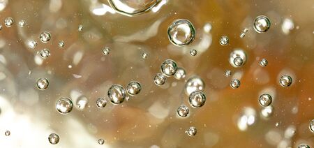 Bubbles of air on the surface of water as an abstract background .の写真素材
