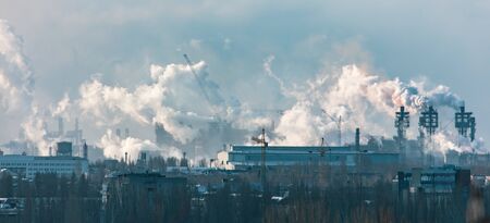 Smoke from the pipes of a metallurgical plant.の写真素材