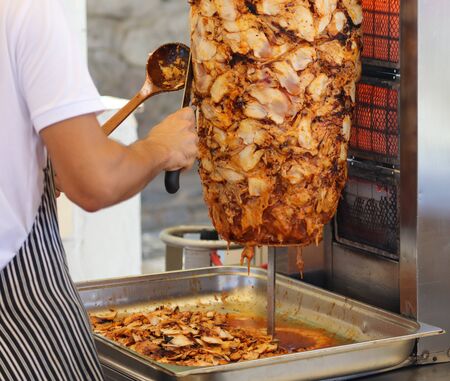 Grilling meat for pita bread. On the street in Turkeyの写真素材
