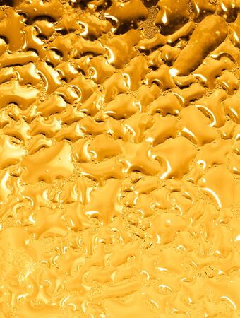 Drops of water on a gold background. Macroの写真素材