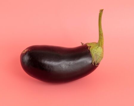 Eggplant isolated on a pink background.の写真素材