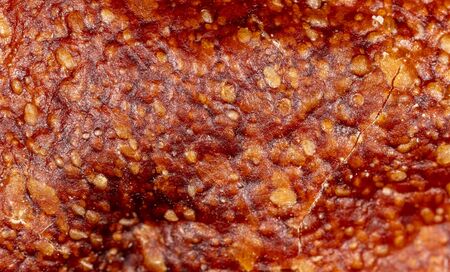 Brown bread crust as an abstract background.の写真素材