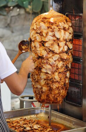 Grilling meat for pita bread. On the street in Turkeyの写真素材