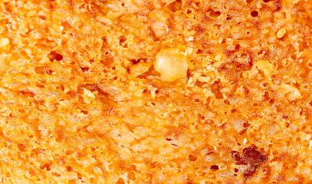 Brown bread crust as an abstract background.