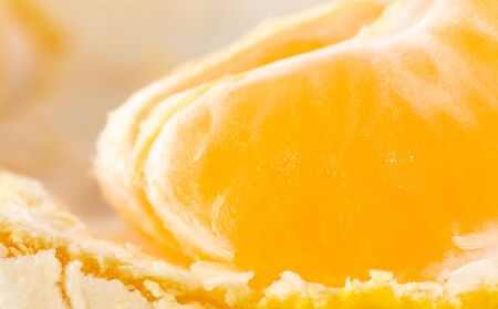 Peeled tangerine as a background. Macro