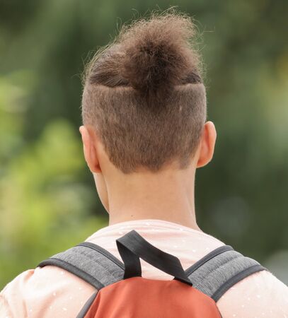 Hair in a fashionable hairstyle in a man.の写真素材