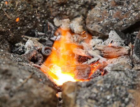 Burning coals in the forge.