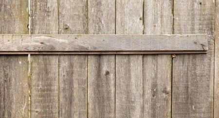 Old wooden boards on the fence as a background.の写真素材