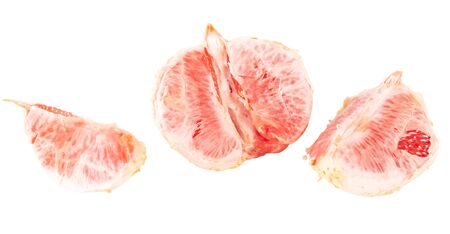 Peeled pomelo is isolated on a white background.の写真素材