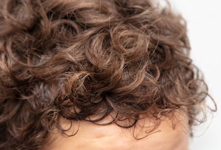 Curly hair on the boy's head.の写真素材