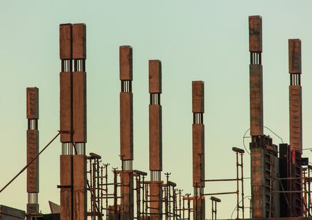The construction of a multi-storey building at dawn.の写真素材