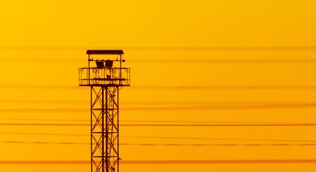 Metal construction at dawn of the sun.の写真素材