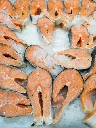 Frozen fish steaks in the store as a background.の写真素材