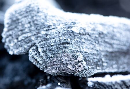 White snowflakes on the corner as an abstract background. Macroの写真素材