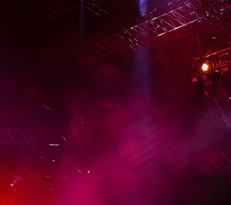 Purple light on a rock concert stage as background.の写真素材