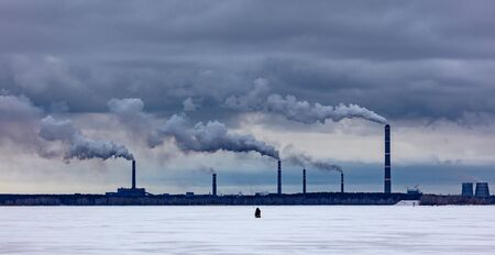 Smoke from the chimneys at the factory.の写真素材
