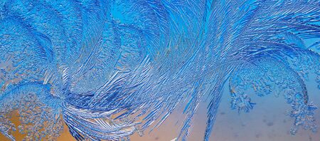 Natural pattern on glass at dawn of the sun. Abstract backgroundの写真素材