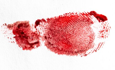 Fingerprint of red paint on a white paper.