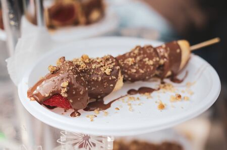 Banana dessert with chocolate in a plate.の写真素材
