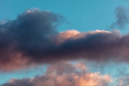 Colorful clouds at dawn of the sun.