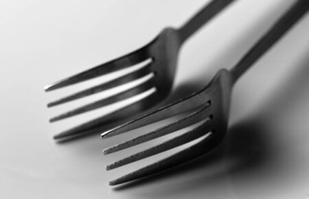 Photo of a fork with shadow.の写真素材