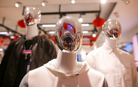 Sanya, Hainan Island, China - January 12, 2020: Mannequin with clothes on a shop window.のeditorial素材