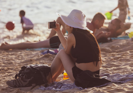 Sanya, Hainan Island, China - January 8, 2020: Girl on the beach in Dadonghai Bay.のeditorial素材