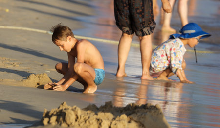 Sanya, Hainan Island, China - January 8, 2020: Boy on the beach in Dadonghai Bay.のeditorial素材